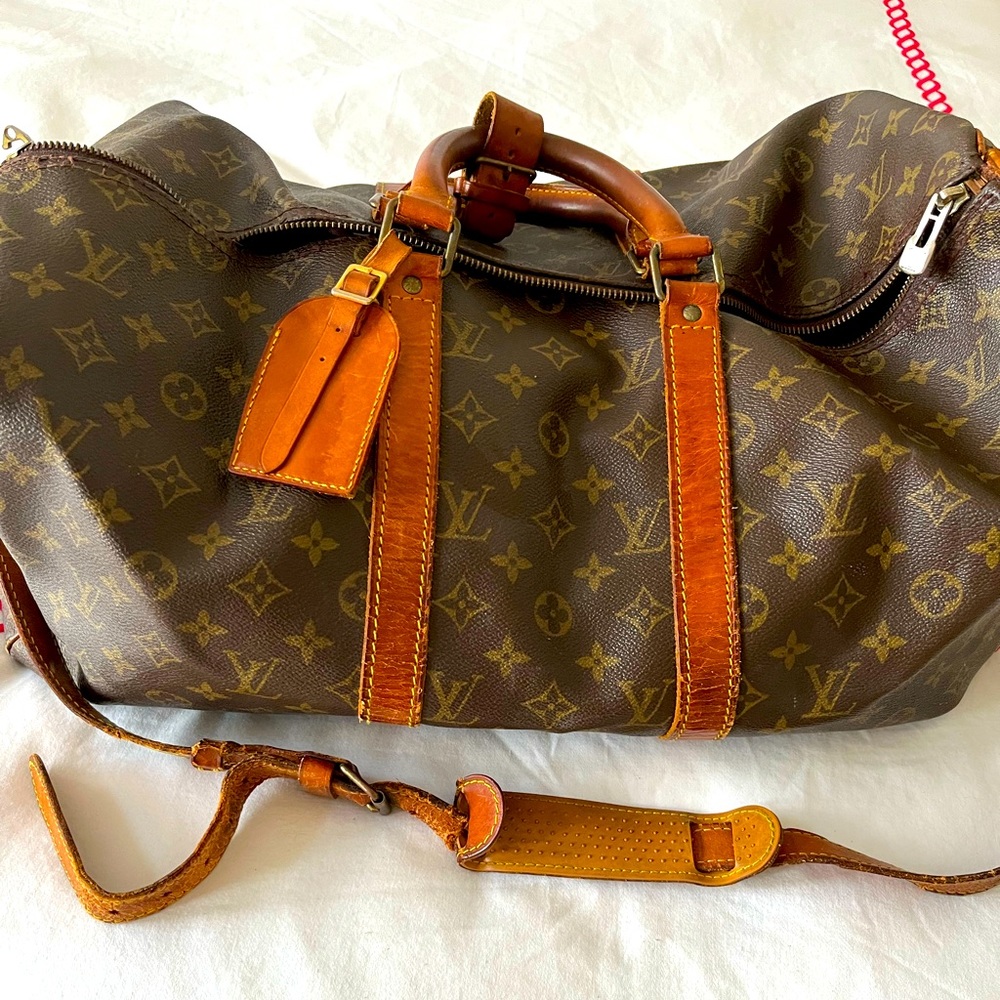 Authentic Louis Vuitton carry all;  20 inches from seam to seam